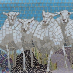 Four benches and two statues with glass mosaics in Ermelo